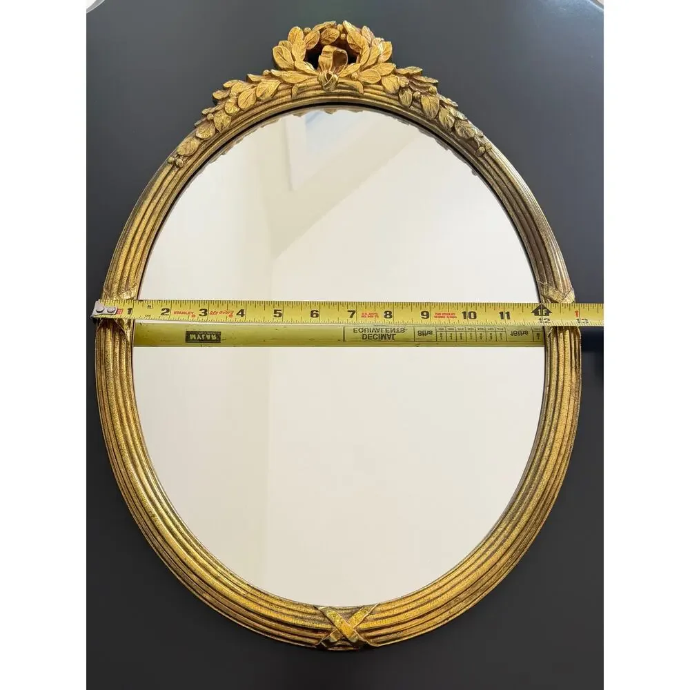 Vintage Hollywood Regency style mirror gold classic leaf wreath and ribbon crest